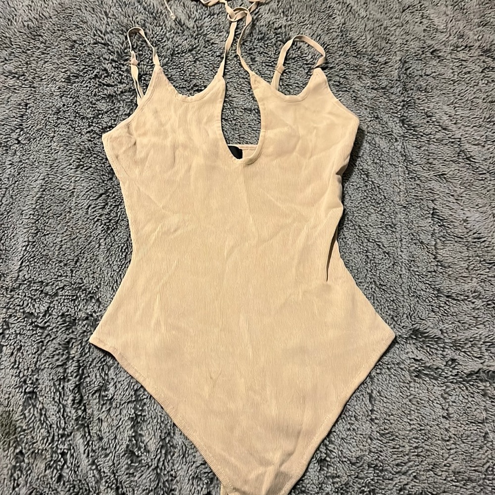 Tan body suit